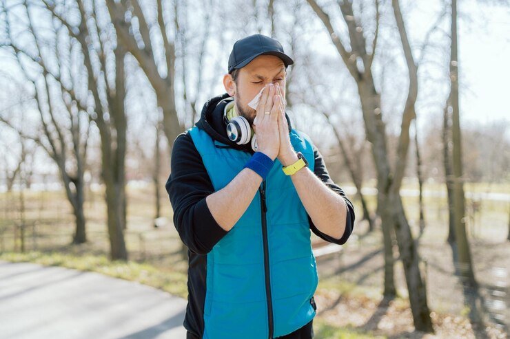 man with pollen allergy stands outside park athlete stops running practice due runs 616370 1653