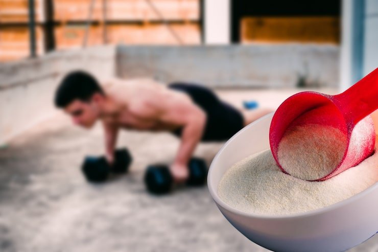 protein shake vanilla flavor accompanied by weights sportsmen background 164523 413