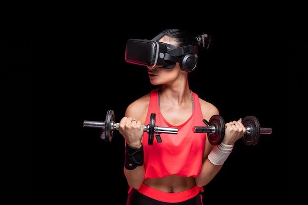 beautiful sportive caucasian athlete sports woman training pink undershirt with black background 1048944 23068834